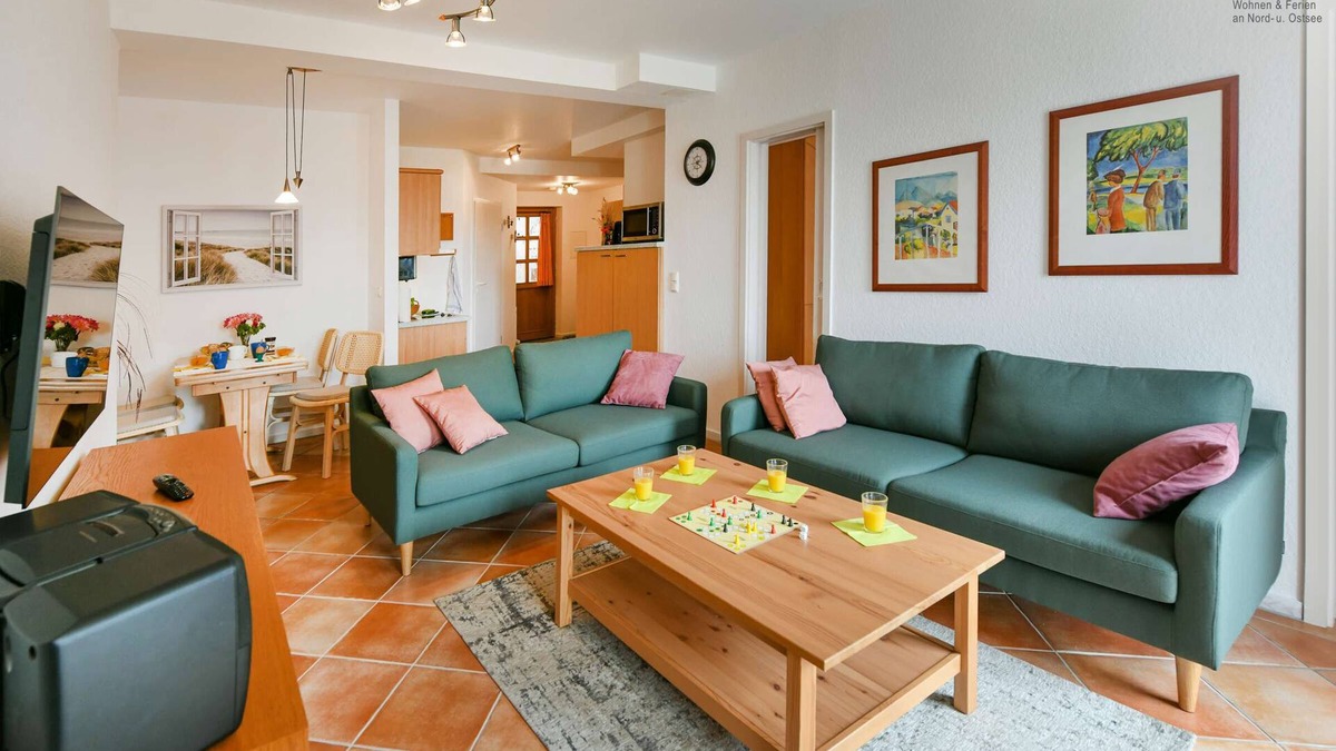 Neuensien Apartment | Comfortable vacation apartment with lake view and conservatory in the Seedorf vacation park