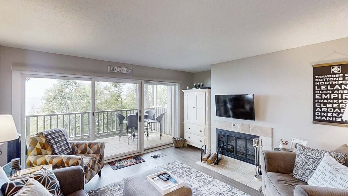 Maple City Condo | Comfy Glen Arbor condo with stunning Lake Michigan views, deck, & fireplace
