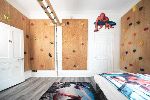 Chesley House | Comic House with Climbing Wall & Themes
