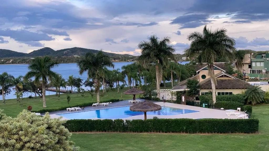 Porto da Lagoa House | Completo apartamento em Resort na beira da lagoa