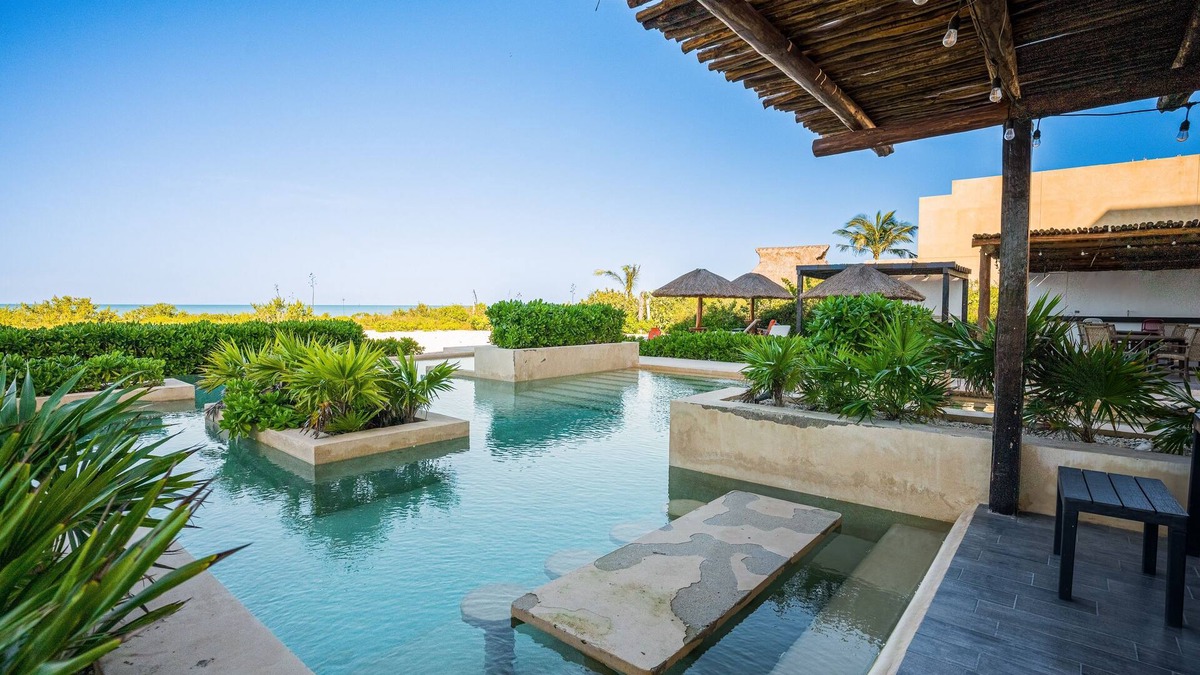 Miramar Apartment | Contemporary beachfront apartment with pool, gym, ocean views, and balcony space