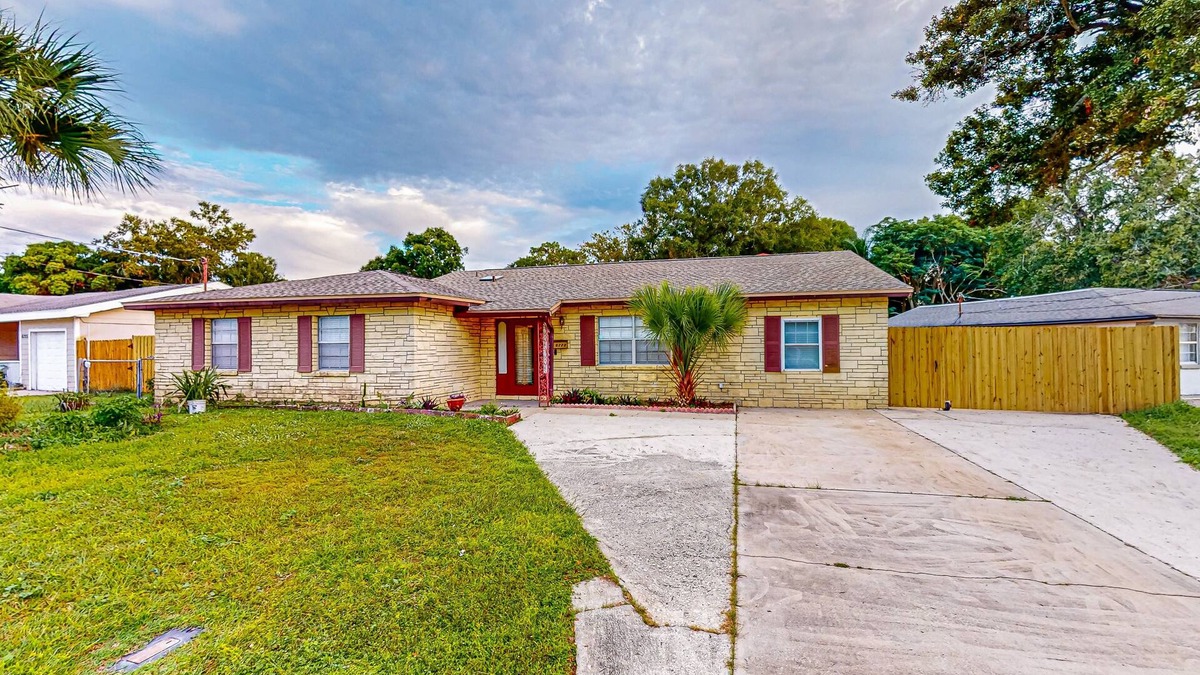 Orient Park House | Conveniently located home with private pool, patio, foosball, & private W/D