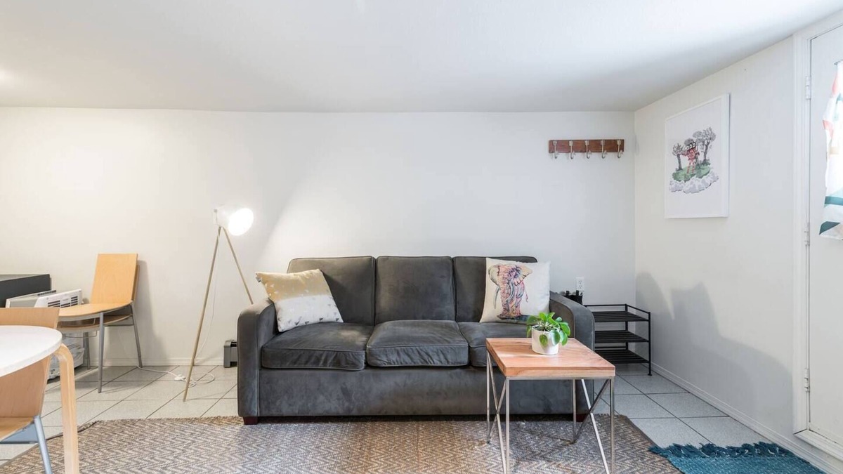Kensington-Cedar Cottage House | Cool, cozy and modern space with a garden patio to enjoy meals in sunny weather.