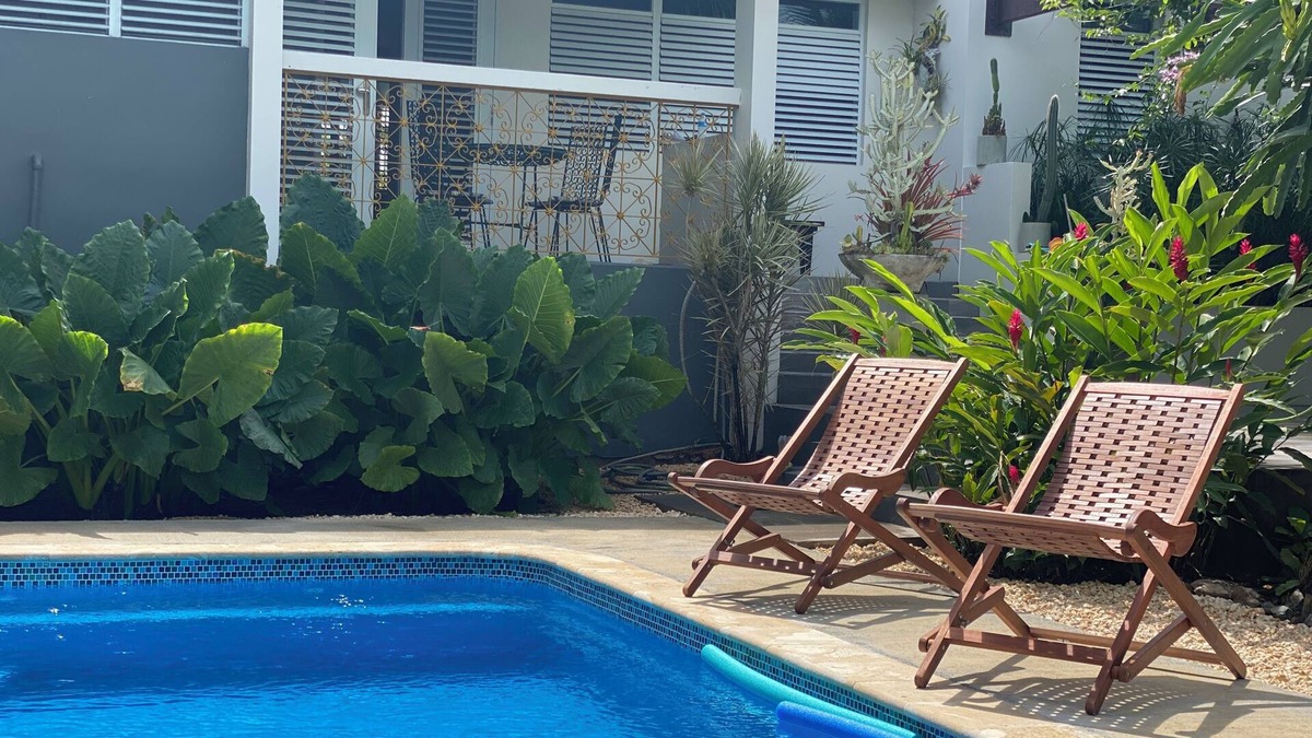 Florida House | Cool Vibe Island Home with a designer garden & new pool. A/C in bedrooms!