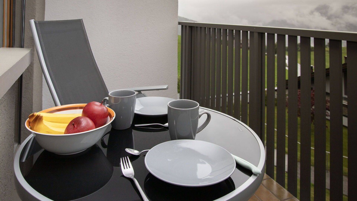 Falera Apartment | Cosy apartment for 3 guests with WIFI, pool, TV, balcony and panoramic view