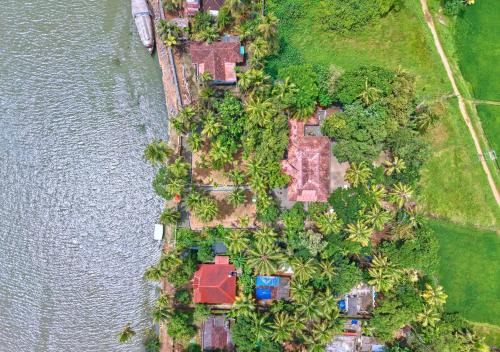 Mankombu House | Cotelac Heritage Lake Resort by VOYE HOMES