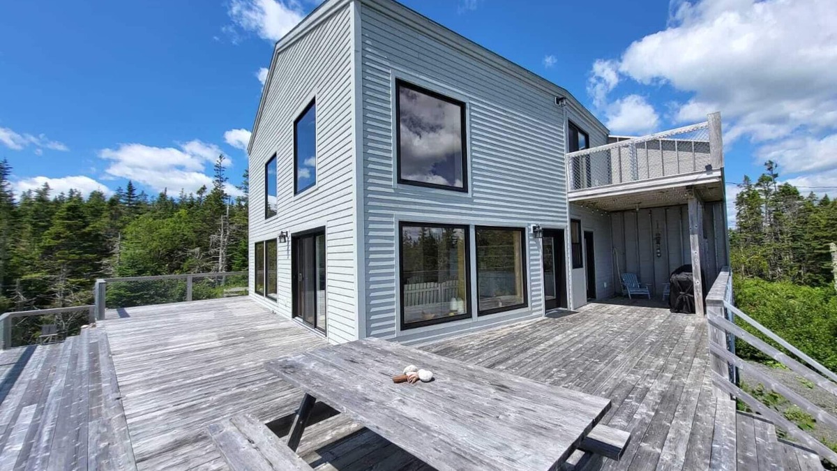Holland Harbour House | Cottage at the Atlantic - Large deck and panoramic ocean views