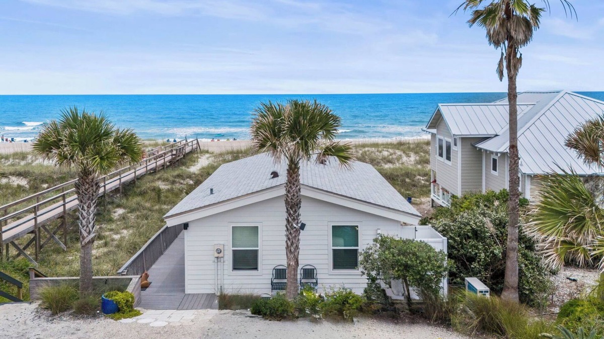 Ocean Cay House | Cottage by the Sea features front row views of the beautiful beach and Atlantic Ocean.