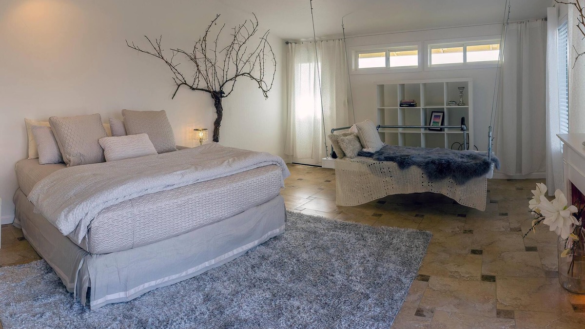 Talent Apartment | Cottage offers a sectional sofa, chef's kitchen and open floor plan.
