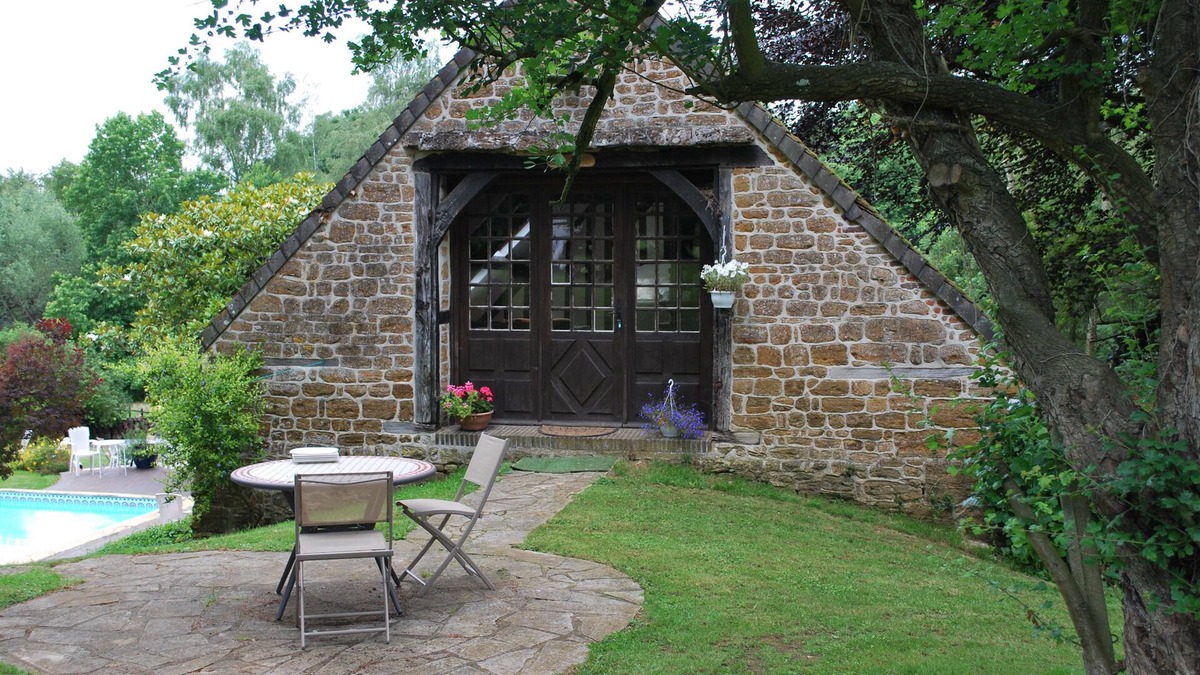 Guerquesalles Cottage | Cottage with shared swimming pool, hot tub, fishing, tennis, UK TV and Wi-F