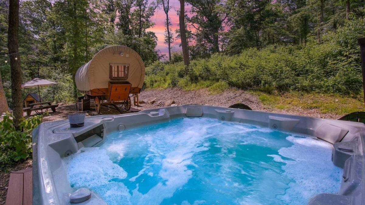Strasburg RV Rental | Covered Wagon Camping w/Salt Water Hot Tub