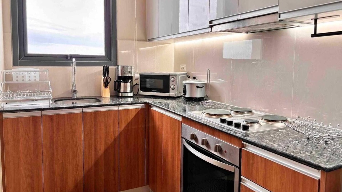 Lapu-Lapu Condo | Cozy 2. 5 bedroom condo with WiFi, fitness room in serene Lapu-Lapu City