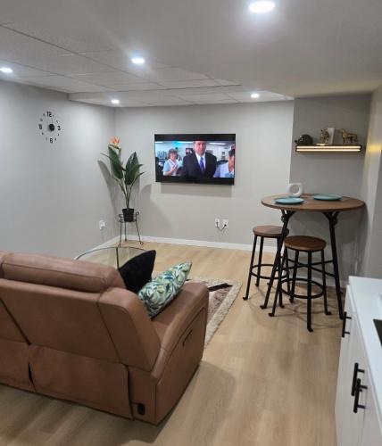 Pinehouse Apartment | Cozy 2 bedroom basement with side entrance