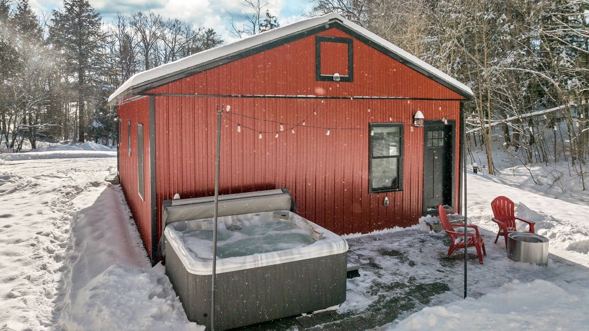 Norwich House | Cozy 2BR/1BA cabin for 6. Fireplace, outdoor fire pit, hot tub, and soaking tub.