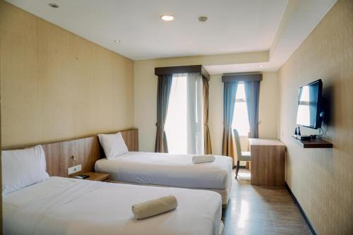Panunggangan Utara Apartment | Cozy and Homey Studio Great Western Resort Apartment By Travelio