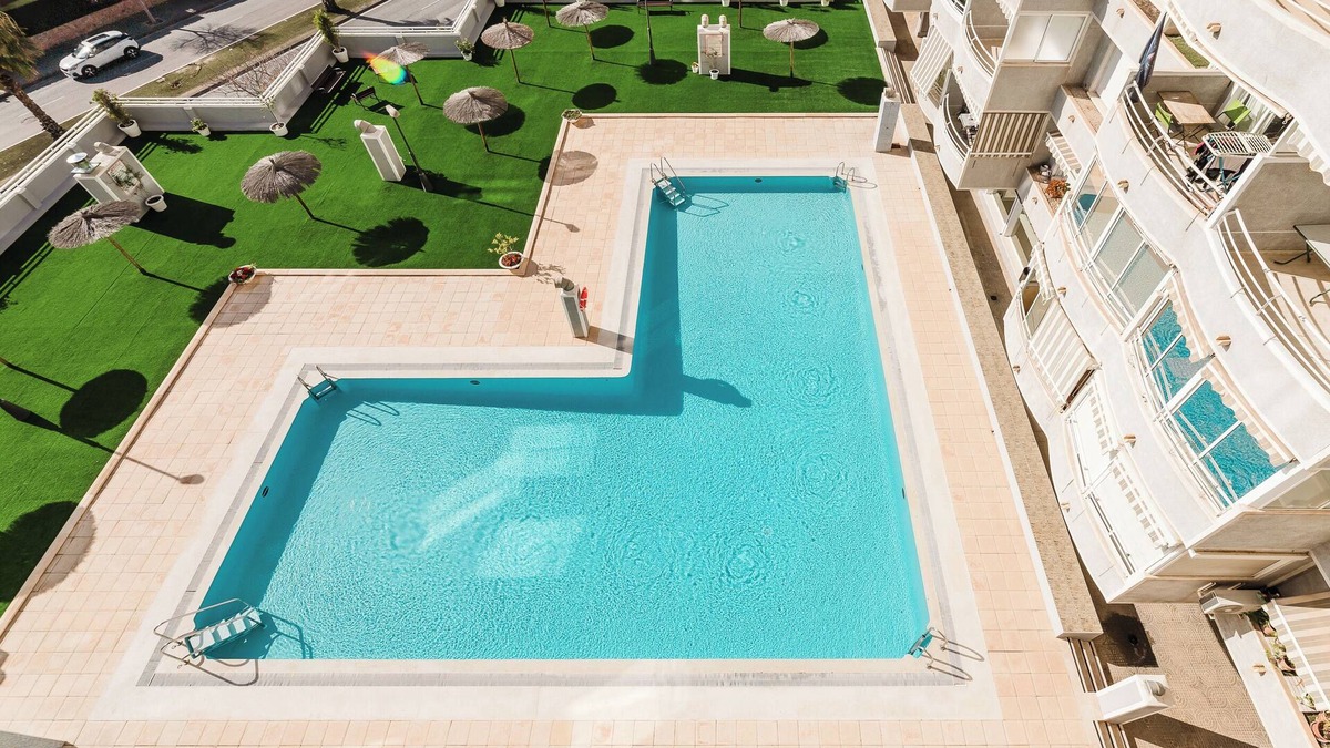 Cabo de las Huertas Apartment | Cozy apartment with swimming pool and balcony, in the best area of Alicante