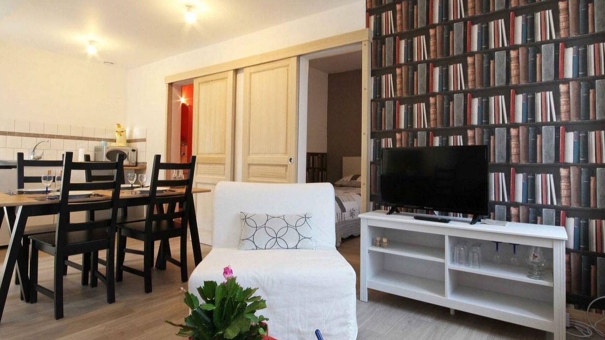 Segrie-Fontaine Apartment | Cozy Apartment Above Café Bookstore with Garden and Electric Bike Rentals