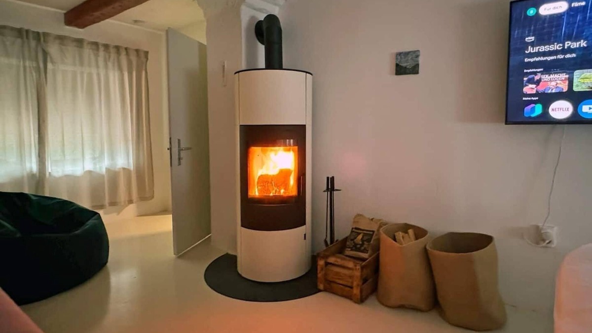 Furstenfeldbruck District House | Cozy Bavarian home with fireplace and fully equipped kitchen.
