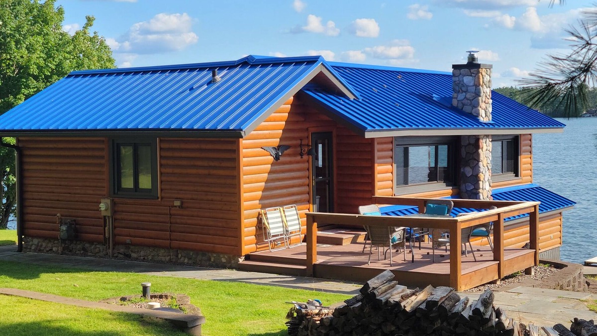 Arbor Vitae Cabin | Cozy boat house on the lake! Private dock and beautiful water views!