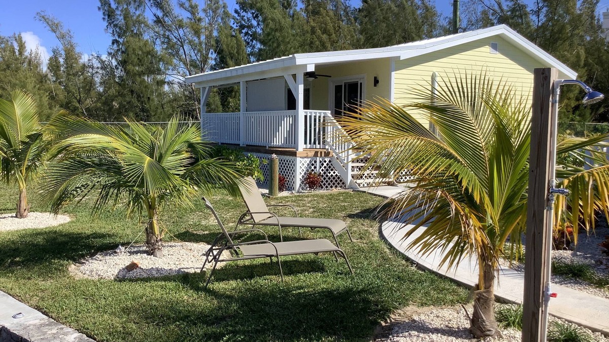 Bahama Reef Apartment | Cozy brand new yellow studio/cottage with free floating dock in Freeport.