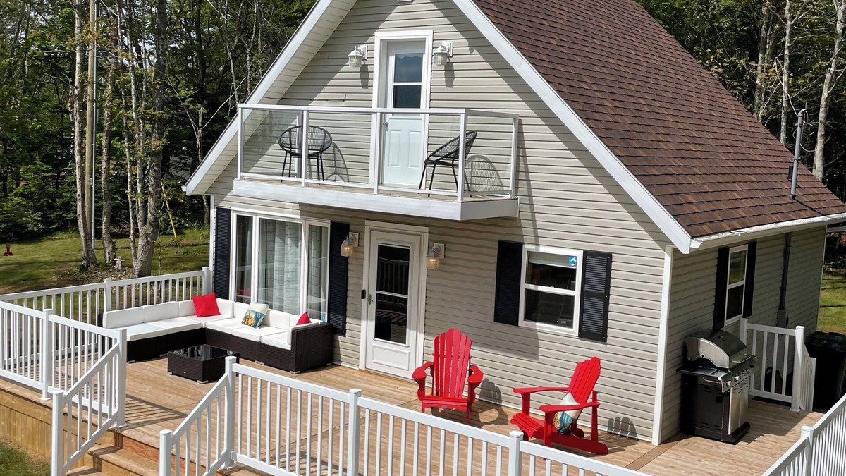 Borden-Carleton Cottage | Cozy cabin style cottage tucked into the woods with a view of the water.