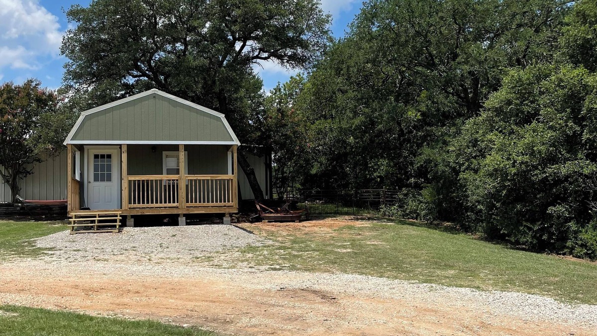 Azle Cabin | Cozy cabin with 1 bedroom and WiFi, AC & located on 40 acres with great views.