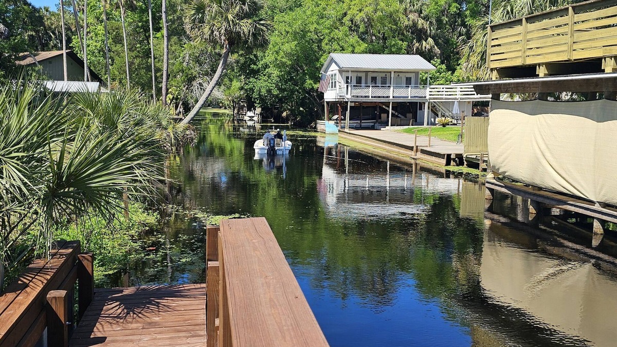Astor House | Cozy canal front house with its own boat ramp and dock. Amazing waterfront view.