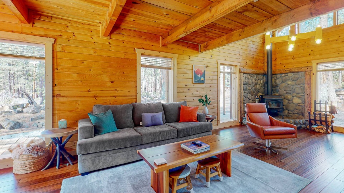 River Forest Acres Cabin | Cozy & colorful retreat with a deck, grill, wood stove, board games, W/D, & AC