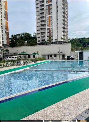 Clark Freeport Apartment | Cozy Condo in Clark Pampanga with Free Parking & Pool Access