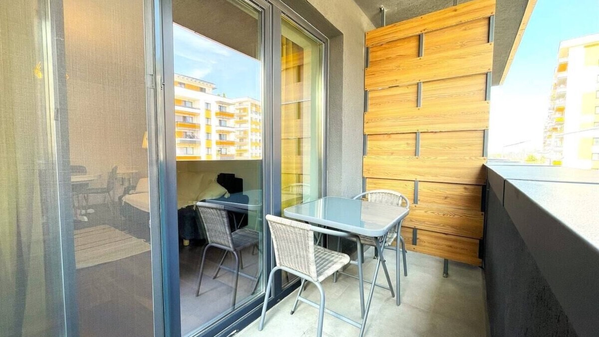 Tractorul Apartment | Cozy Corner Apartment: Baby Crib and High Chair