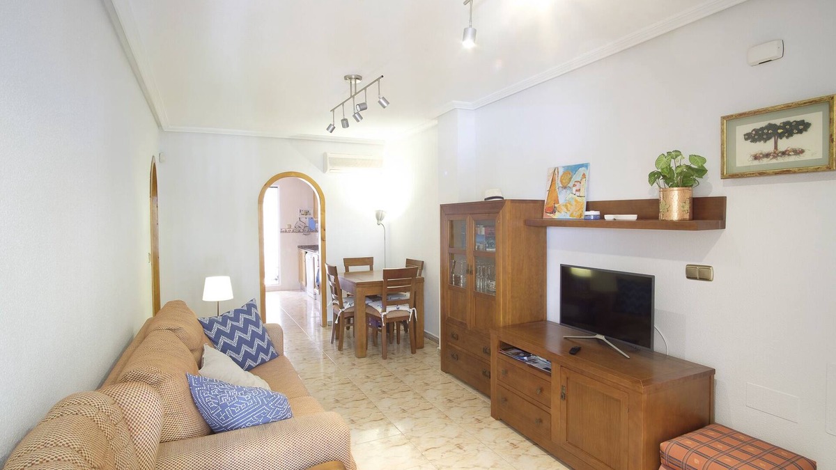La Marina Apartment | Cozy family apartment with patio and terrace and communal swimming pool