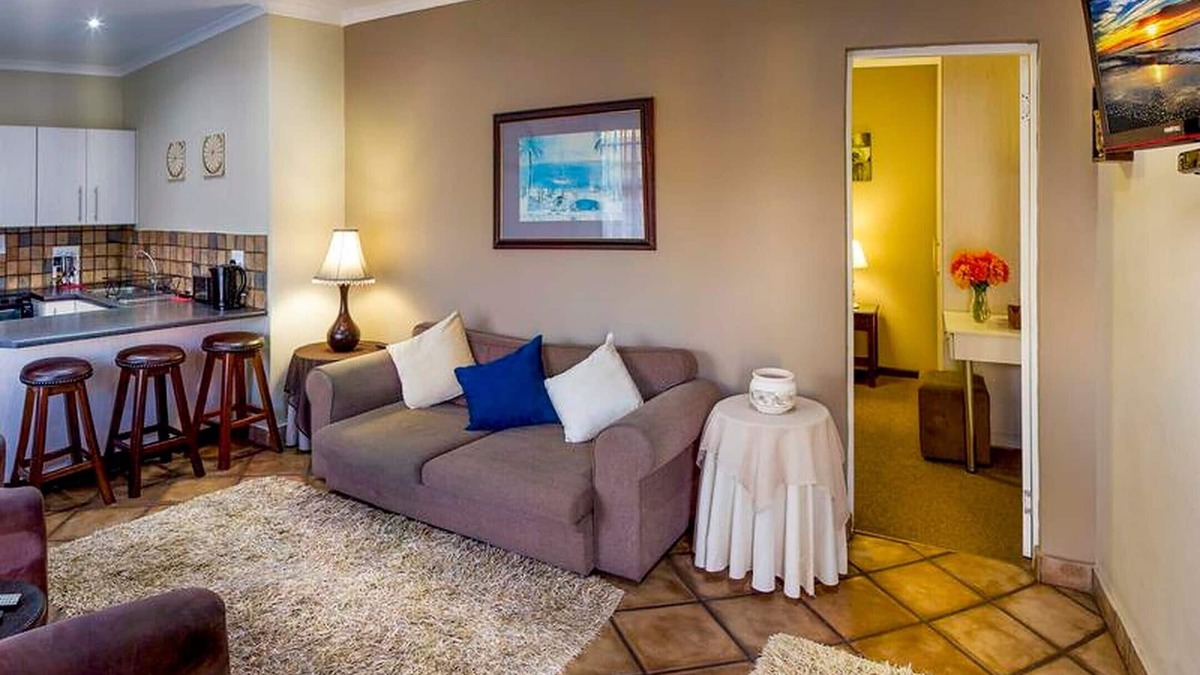 Humewood Bed & Breakfast | Cozy guest room with double bed and kitchen, near Port Elizabeth