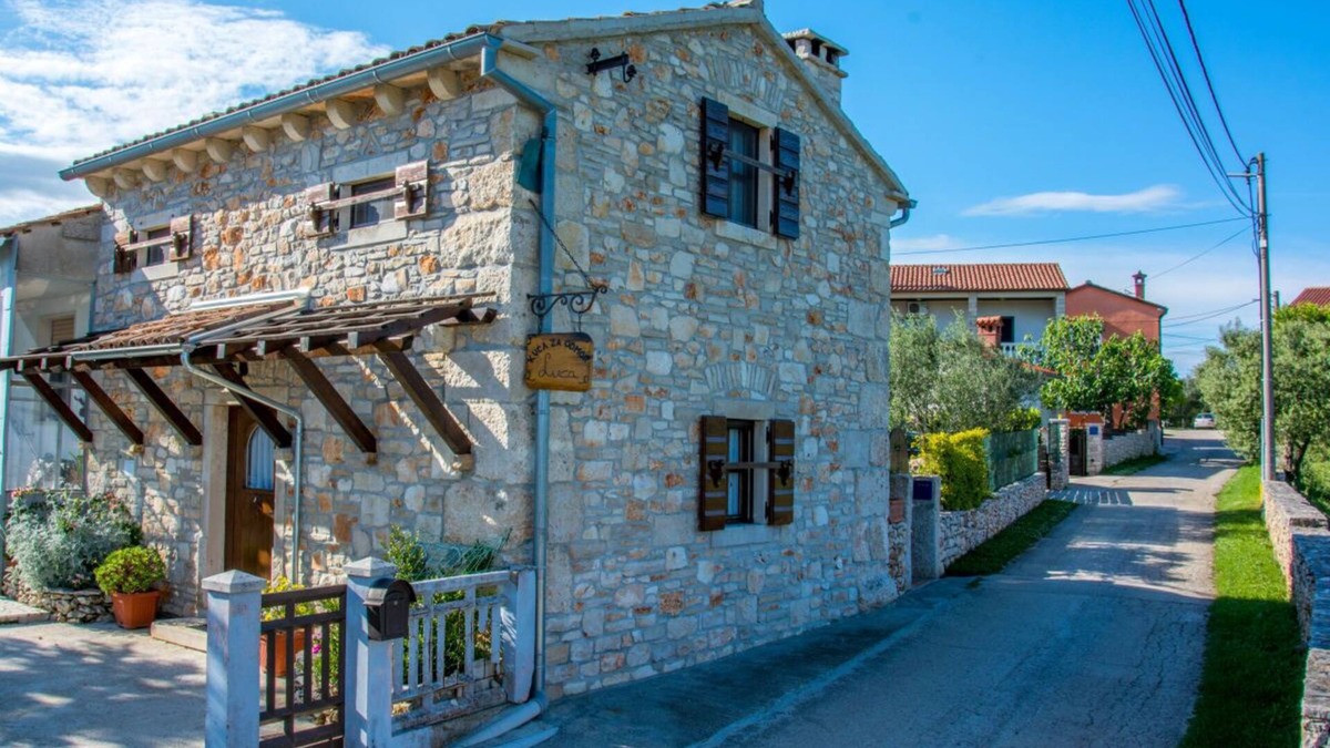 Rakalj House | Cozy istrich stone house with fireplace and garden