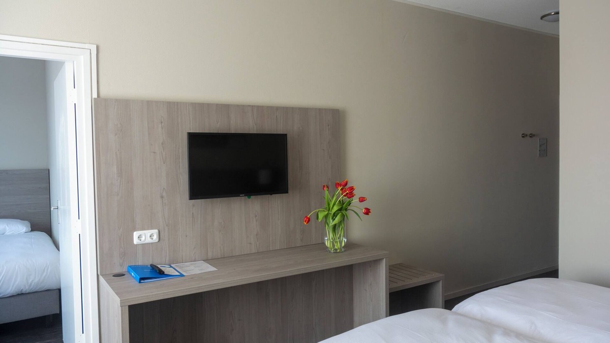 Ooij Hotel | Cozy Riverside Retreat with Outdoor Terrace, and Easy City Access