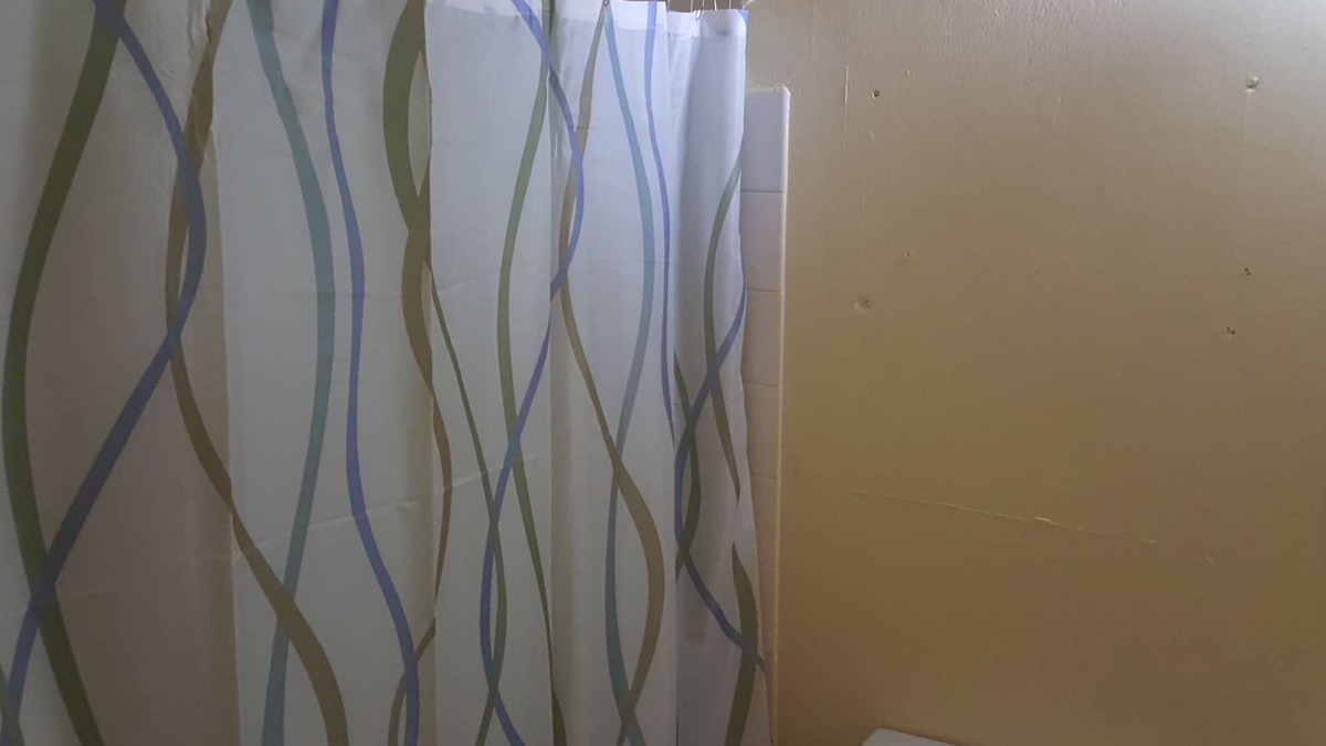 Molynes Gardens House | Cozy town house with two bedrooms that sleeps a maximum of four persons.