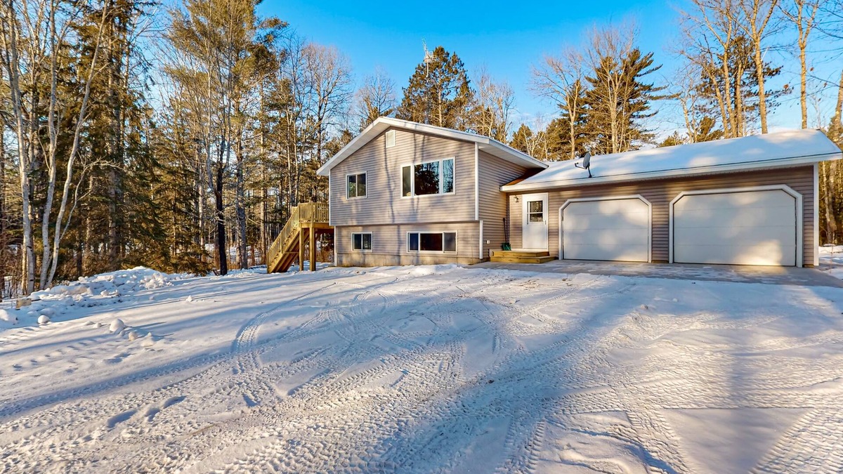 Presque Isle House | Cozy tree-lined home located near town, lakes, walking & bike trails, w/firepit