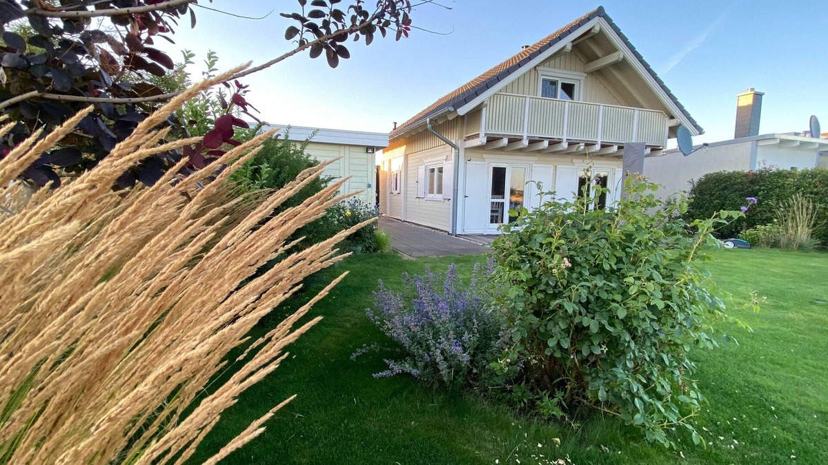 Lobnitz House | Cozy vacation home on the beautiful Mühlfeldsee with private beach, sauna and fireplace