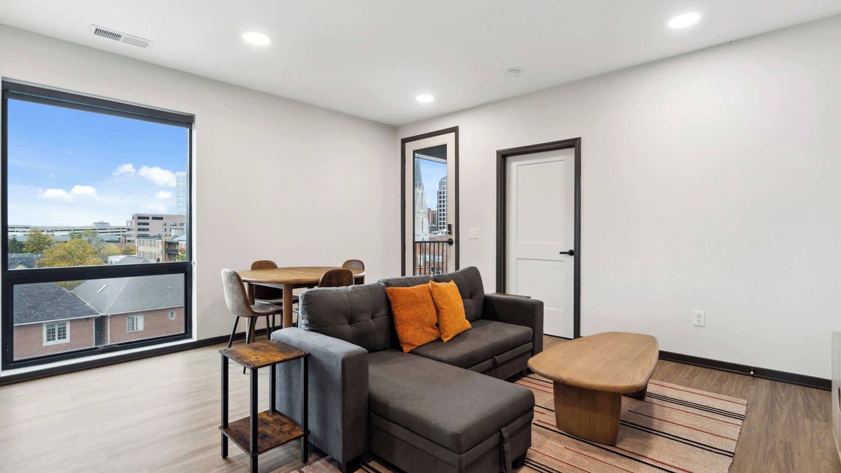 Lockerbie Square Apartment | CozySuites Mass with parking, lounge & roof deck #26