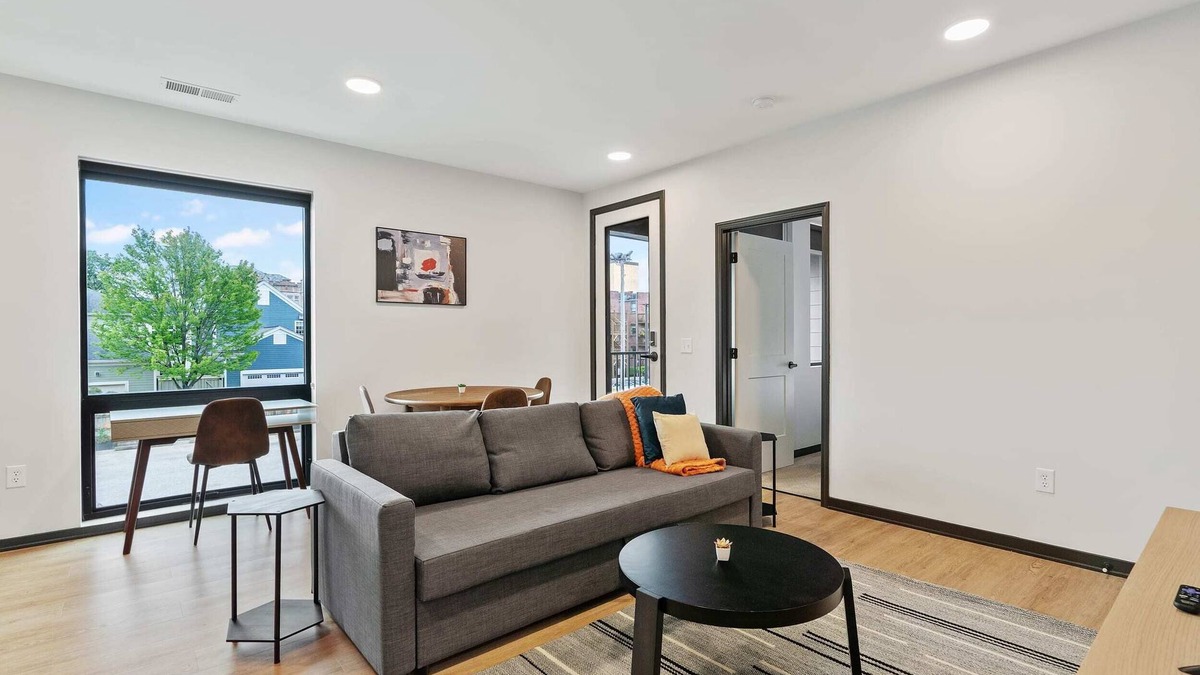 Lockerbie Square Apartment | CozySuites Mass with parking, lounge and roof deck 2