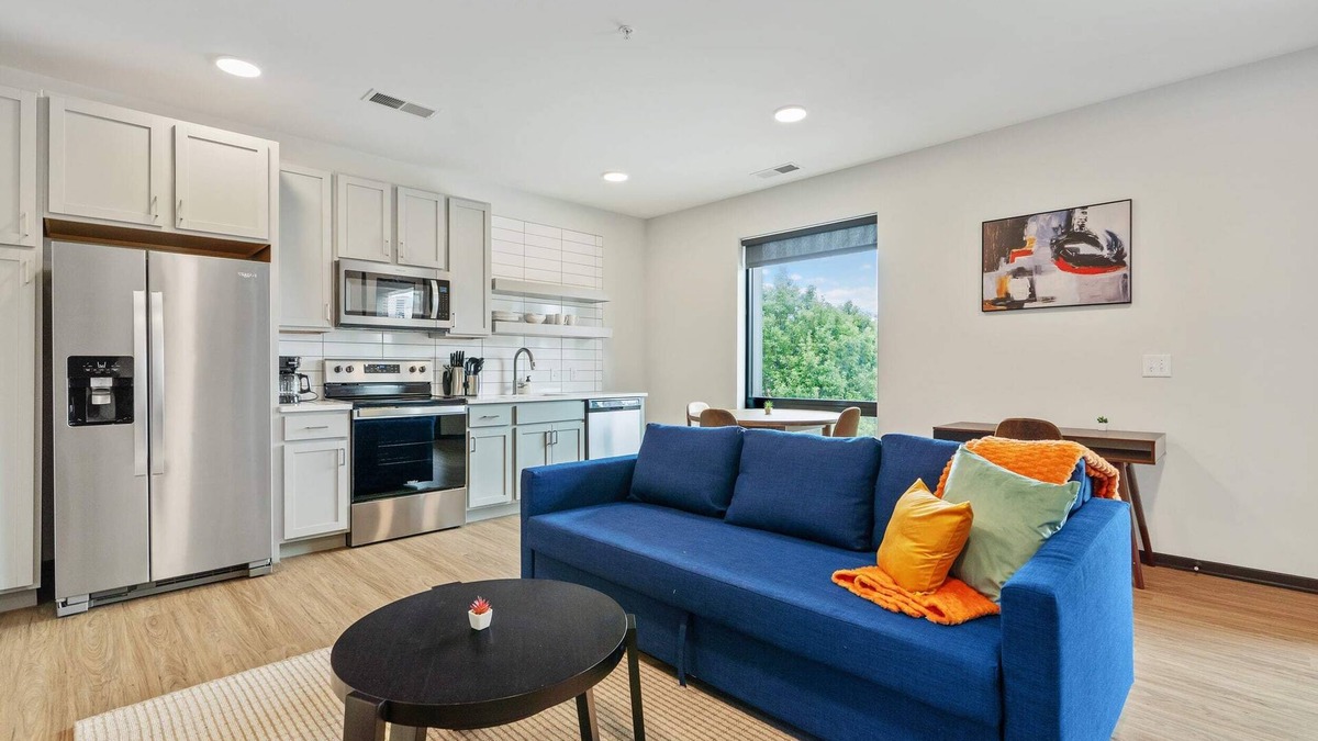 Lockerbie Square Apartment | CozySuites Mass with parking, lounge and roof deck 4