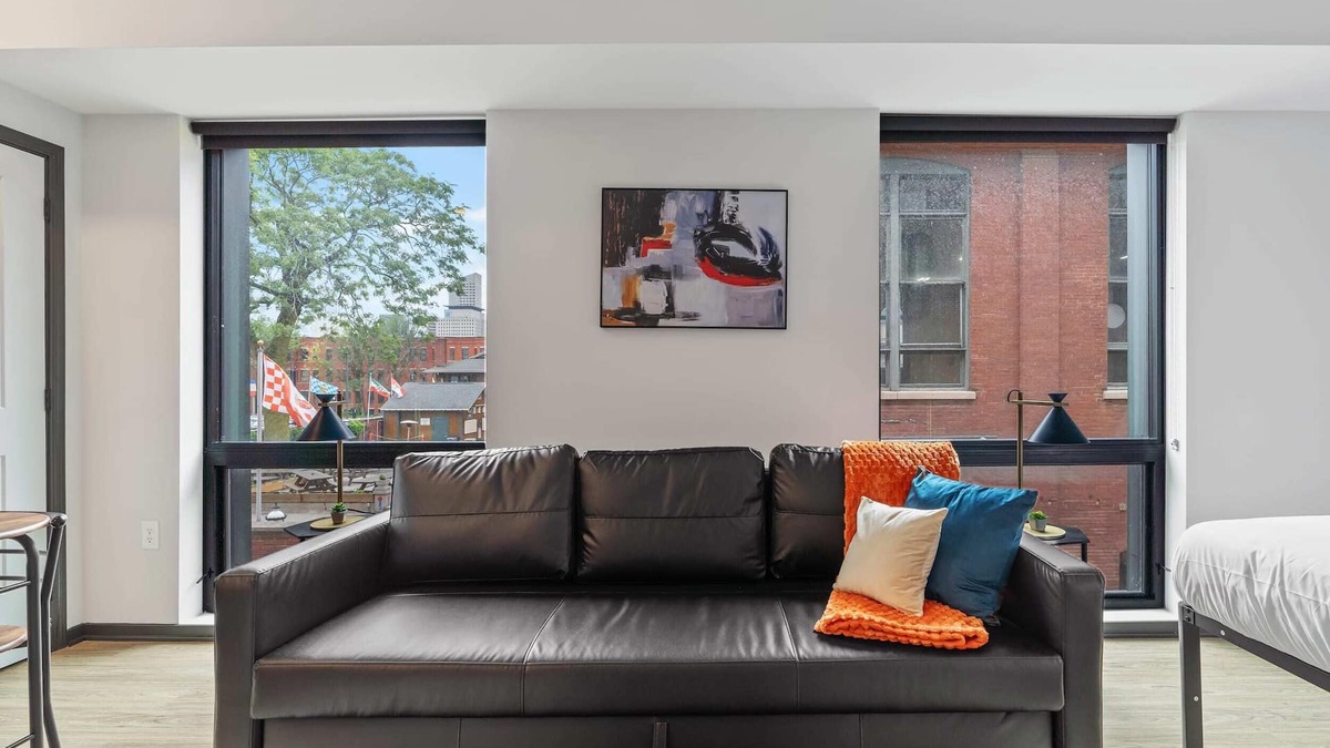 Lockerbie Square Apartment | CozySuites Mass with parking, lounge and roof deck 13
