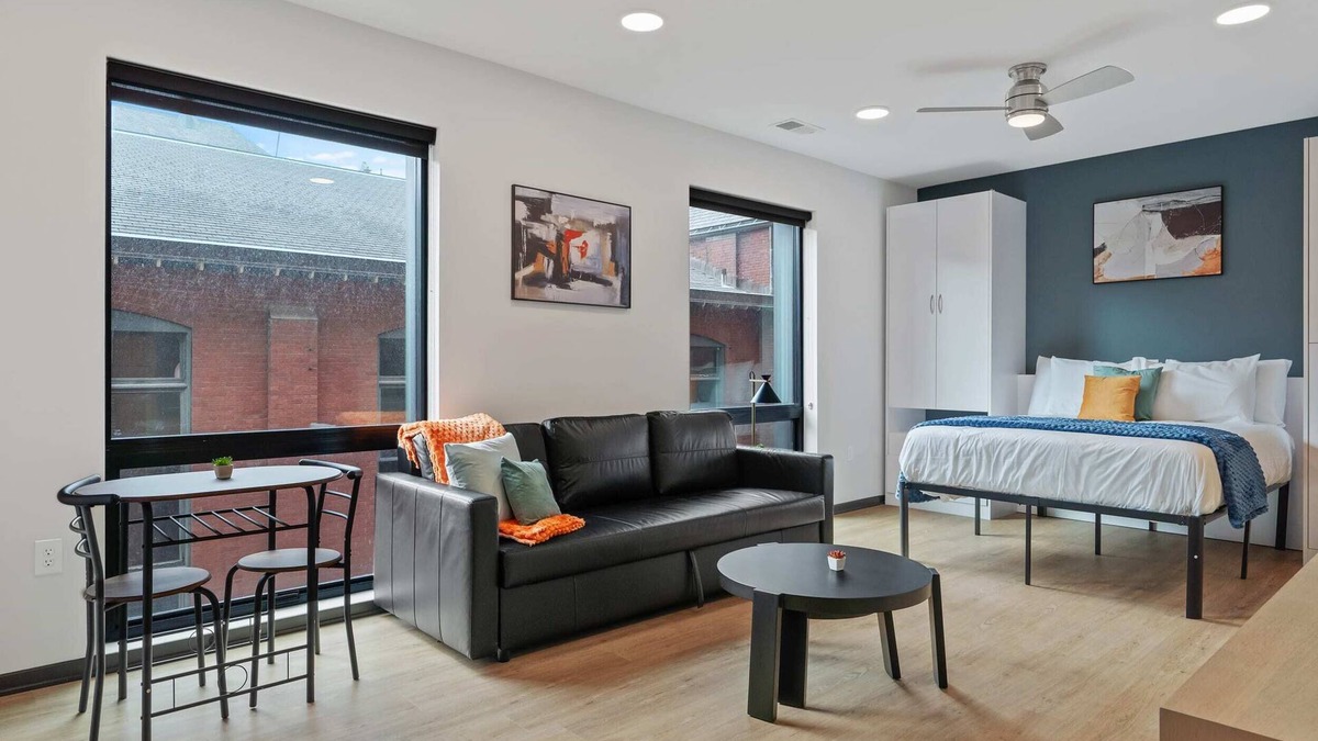 Lockerbie Square Apartment | CozySuites Mass with parking, lounge and roof deck 18