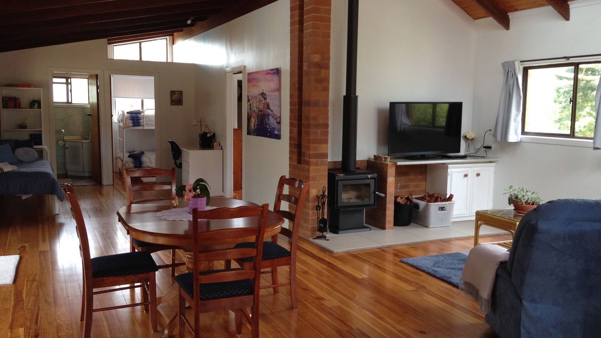 Cranley Cottage | Cranley Garden Retreat with Fireplace & Pool