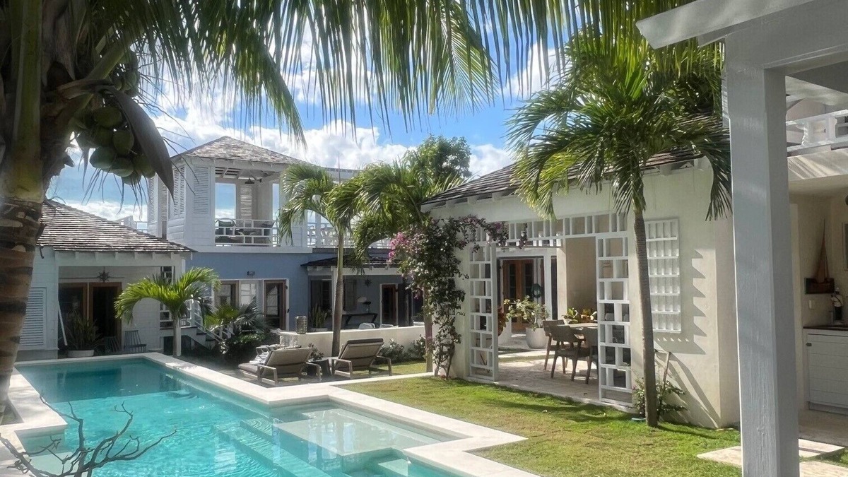 Dunmore Town House | Crown Affair: Village Compound on Charming Lane with 40' Pool & Sunset Views