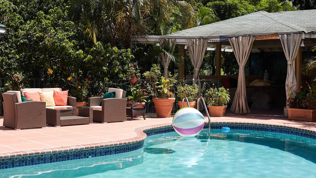 Jack's Hill House | Crowne Gardens. Safe, quiet, luxurious Kingston home with a scenic view.