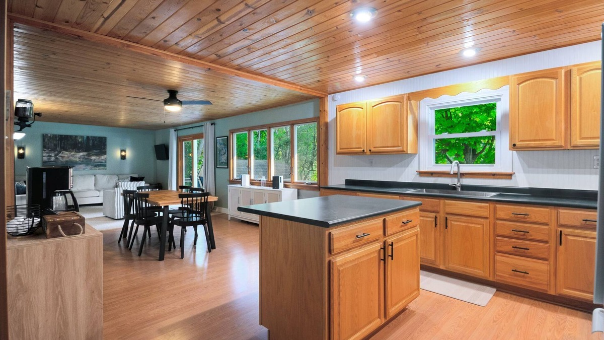 Paris House | Crystal Rapids Retreat: Cozy Up to Autumn's Beauty on the Muskegon River.