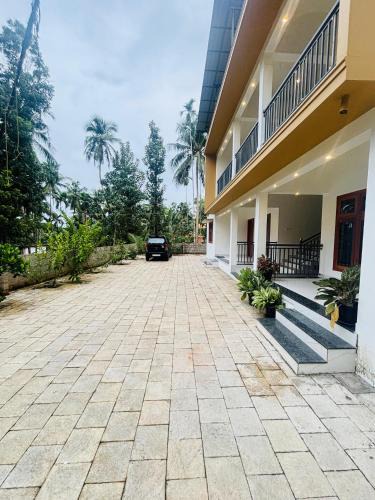 Kedavur House | CT HOMESTAY, Omassery