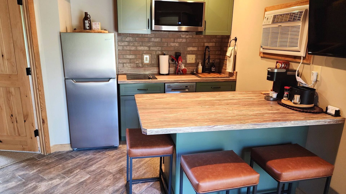 Mancelona Condo | Cute, 1 bdrm sleeps 2 Golf/ski. pool and Wifi! new KING bed. NEW kitchen coming