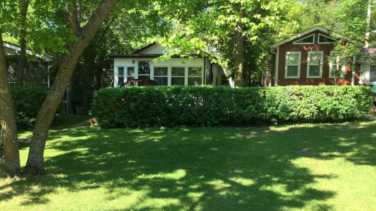 Grand Beach Cottage | Cute and cozy family cottage steps from the beautiful white sands of West beach