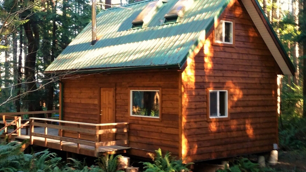 Savary Island Cabin | Cute cozy log cabin nestled in private wooded area between 2 sandy beaches